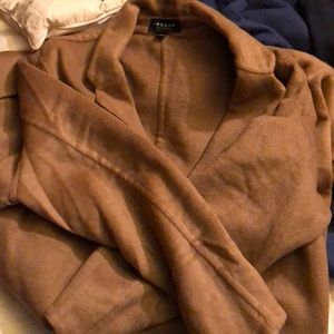 A long, light wool overcoat; worn once; great fit